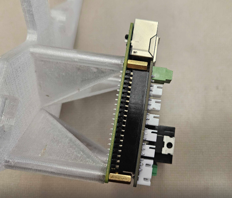 Green computer behind held together